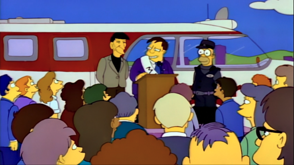 Leonard Nimoy with Mayor Quimby and Homer Simpson for the maiden voyage of the Springfield Monorail.